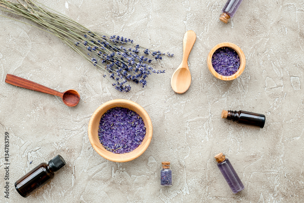 Essential oil and lavender salt with flowers top view