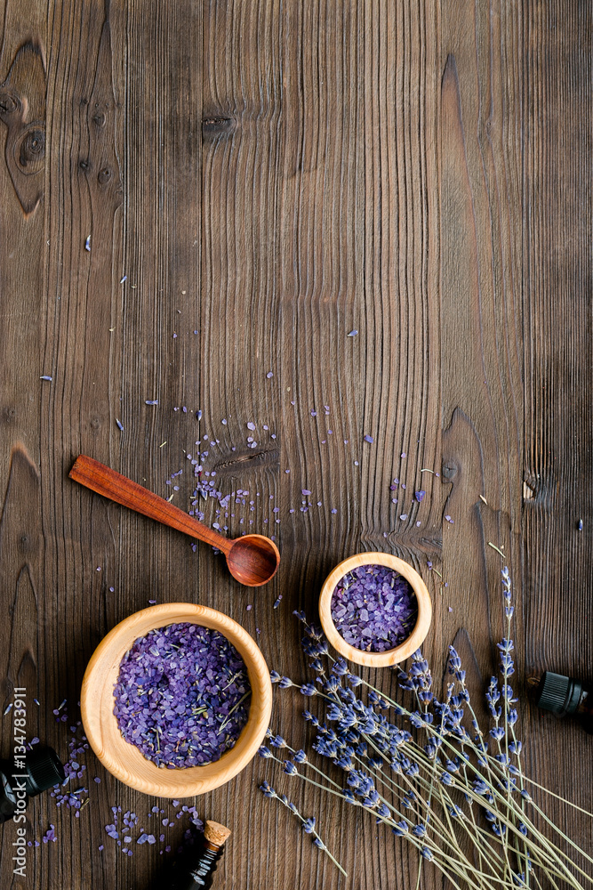 organic cosmetics with lavender on wooden background top view