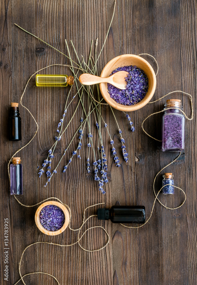 organic cosmetics with lavender on wooden background top view