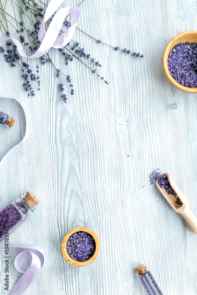 organic cosmetics with lavender on wooden background top view