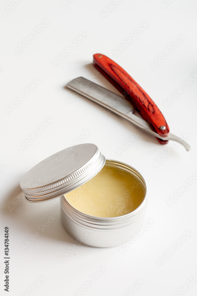 white desktop with tools for shaving beards