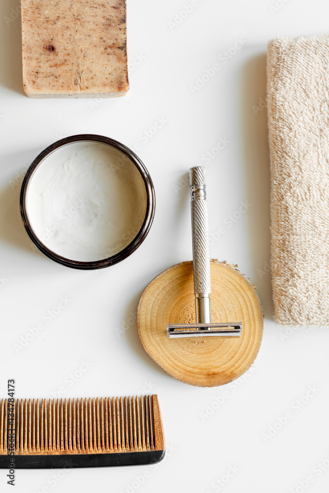 white desktop with tools for shaving beards