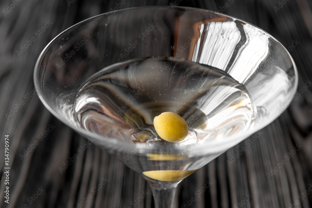 martini cocktail at wooden background close up