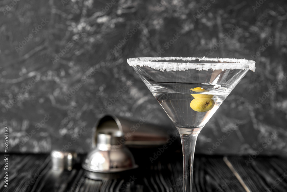 martini cocktail at wooden background close up