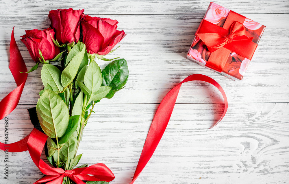 concept Valentines Day with flower wooden background top view