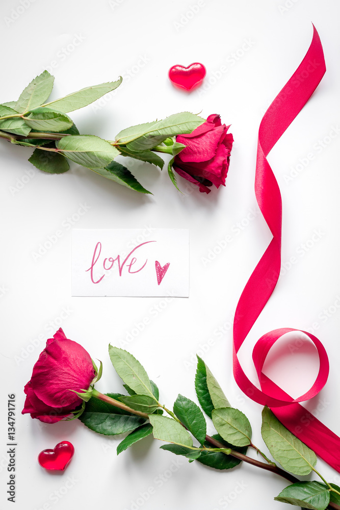 concept Valentines Day with flower white background top view