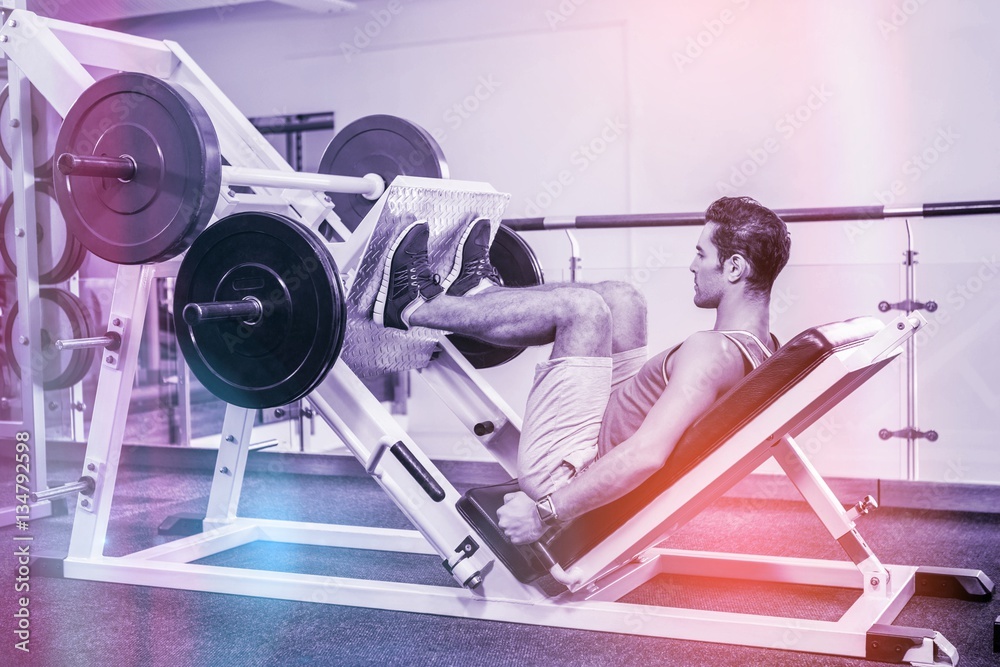 Muscular man doing exercise for legs