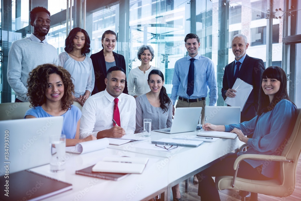 Smiling business people in office