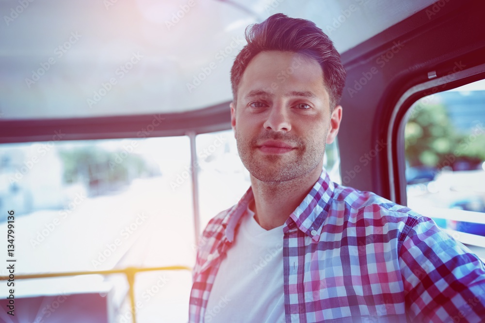 Portrait of man traveling in bus