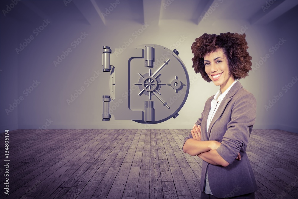 Composite image of businesswoman standing with arms crossed