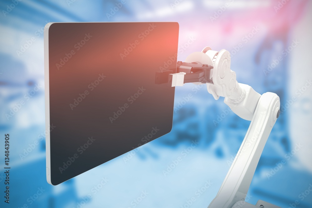 Composite image of graphic image of digital tablet with robot 3d