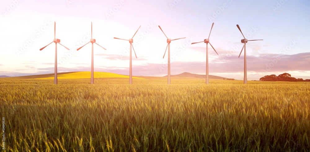 Composite image of digital composite image of wind turbines 3d