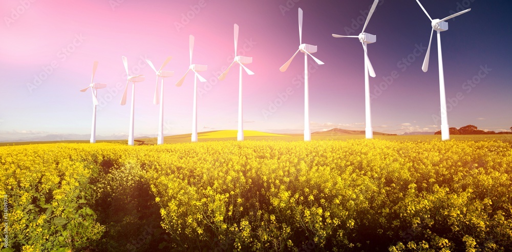 Composite image of digital composite image of wind turbines 3d