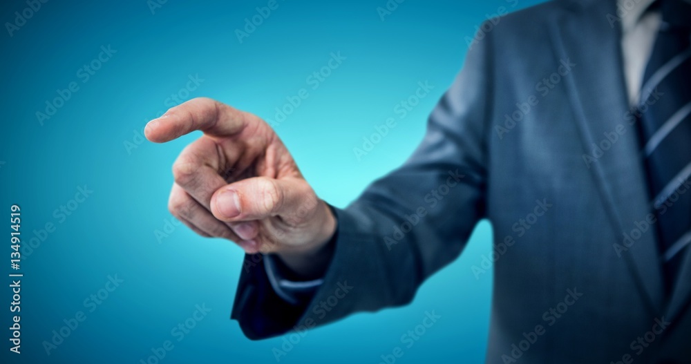 Composite image of midsection of businessman pointing