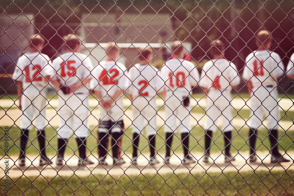 Blurred youth baseball background, children in a row at the begi