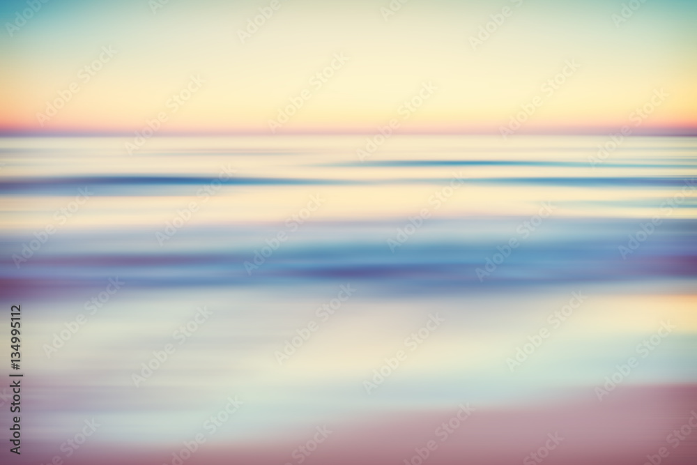 Abstract blurred ocean seascape at sunset