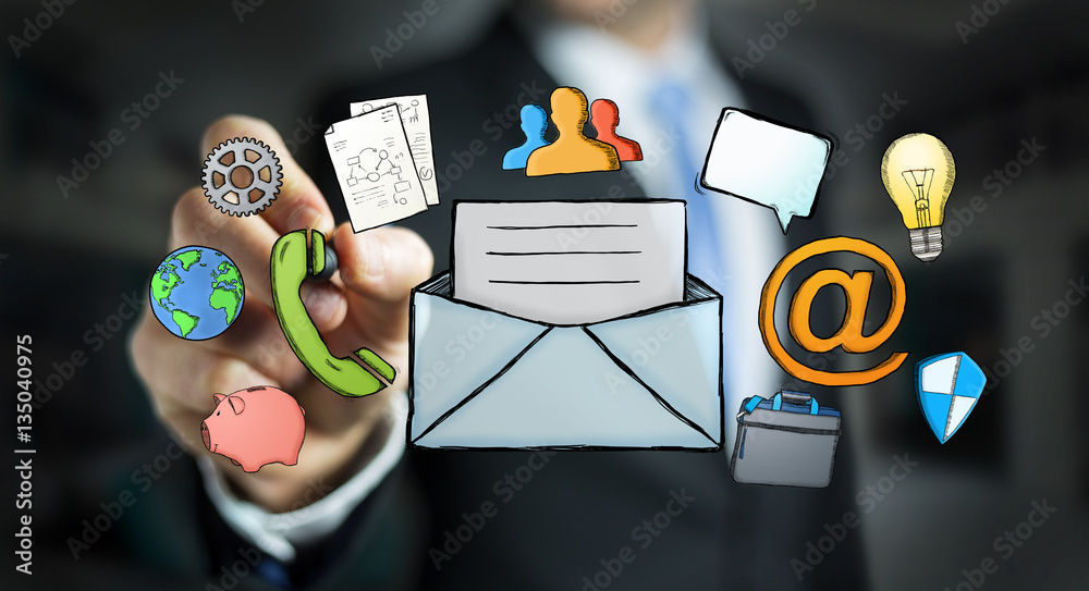 Businessman drawing manuscript contact icon with a pen