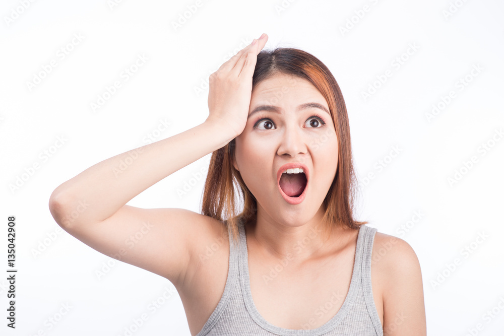 Portrait of exhausted asian  young woman isolated on white.