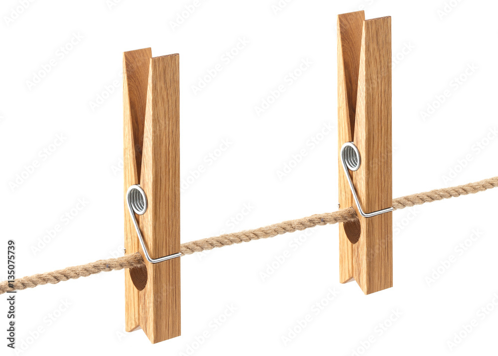 Clothespin on rope isolated on white background, with clipping path