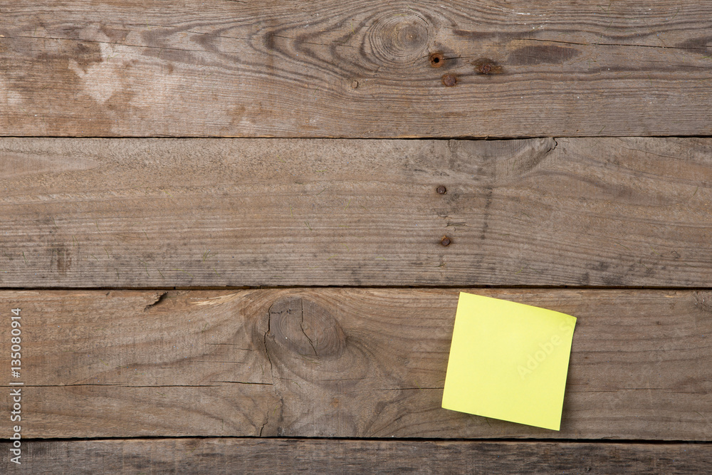 sticky note on the blank blackboard