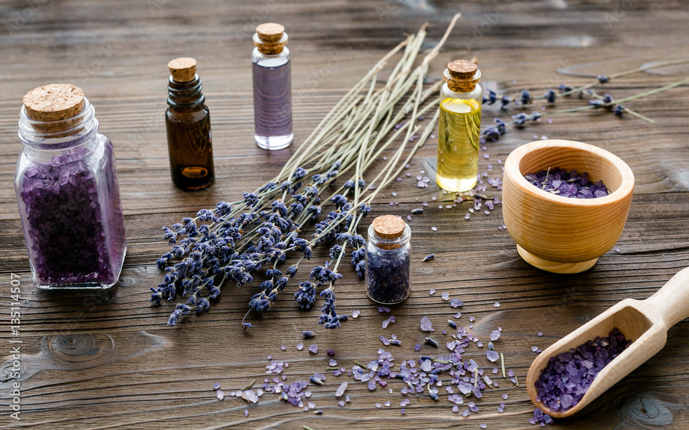 organic cosmetics with lavender on wooden background