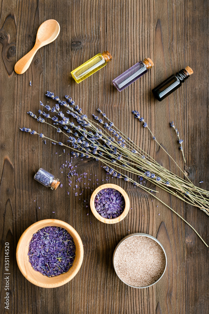 organic cosmetics with lavender on wooden background top view