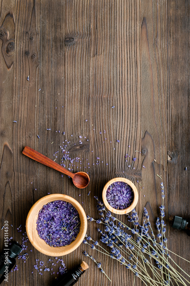 organic cosmetics with lavender on wooden background top view