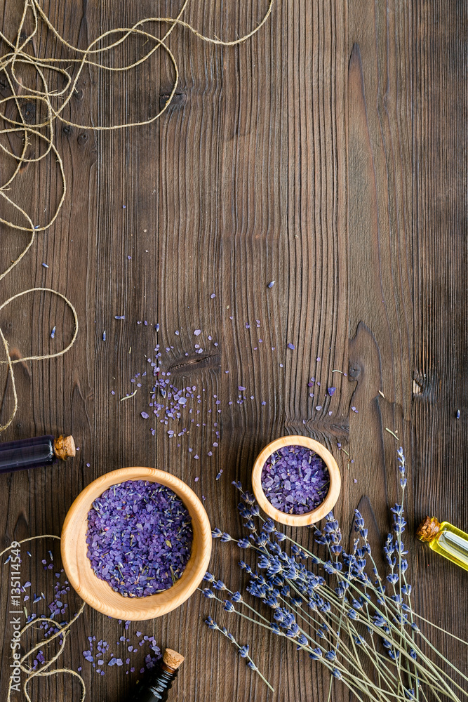 organic cosmetics with lavender on wooden background top view