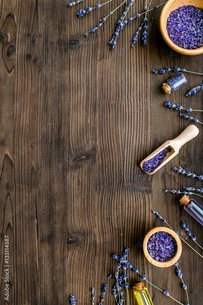 organic cosmetics with lavender on wooden background top view