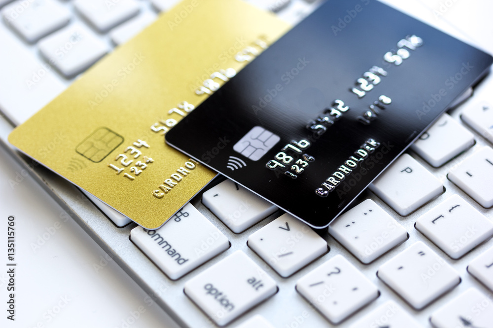 Credit cards on the keyboard close up