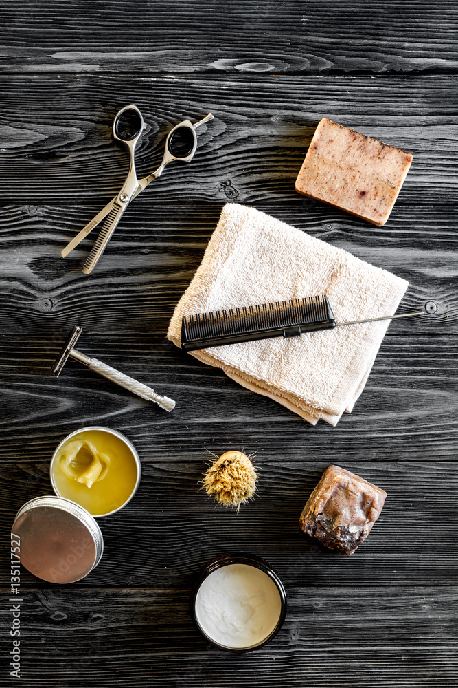 Tools for cutting beard barbershop top view on wooden background