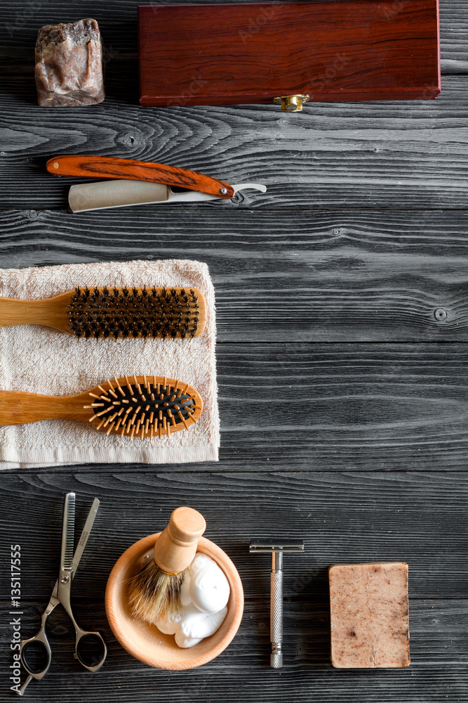 Tools for cutting beard barbershop top view on wooden background