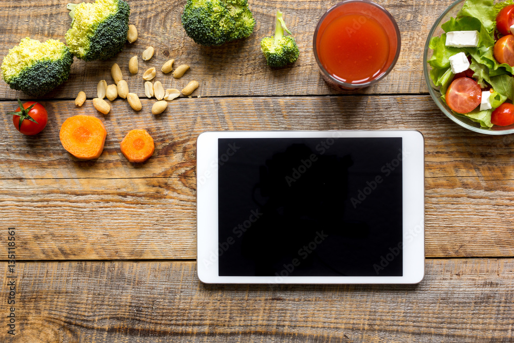 concept diet and tablet with vegetables mock up