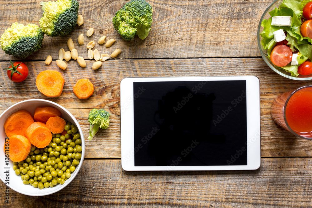 concept diet and tablet with vegetables mock up