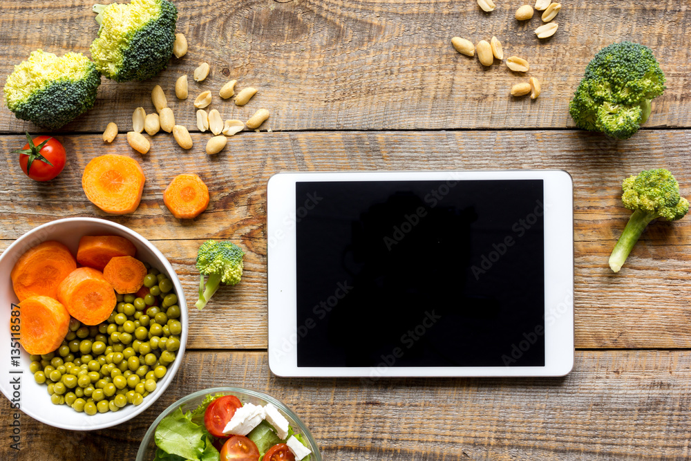 concept diet and tablet with vegetables mock up