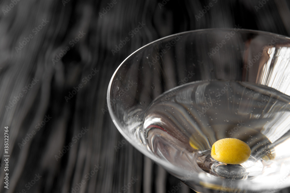 martini cocktail at wooden background close up