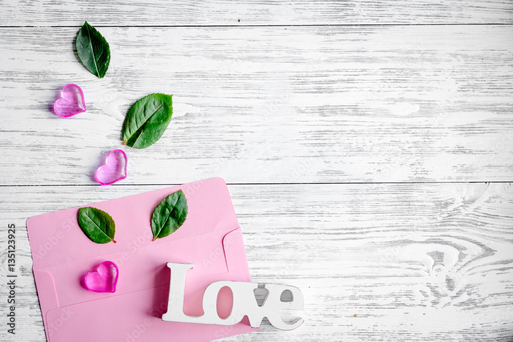 concept Valentines Day with flower wooden background top view