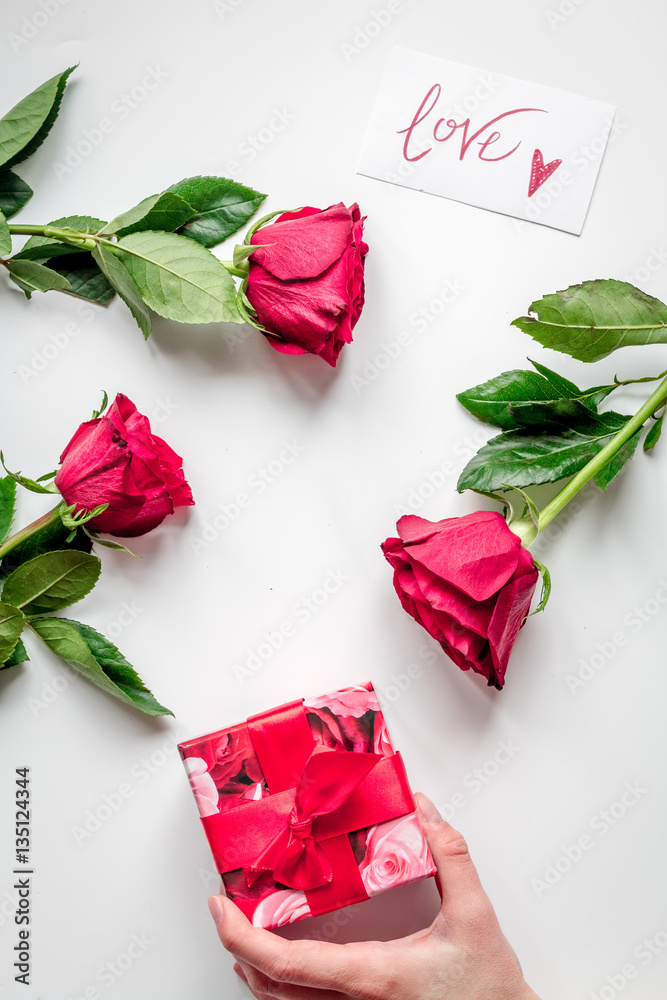 concept Valentines Day with flower white background top view