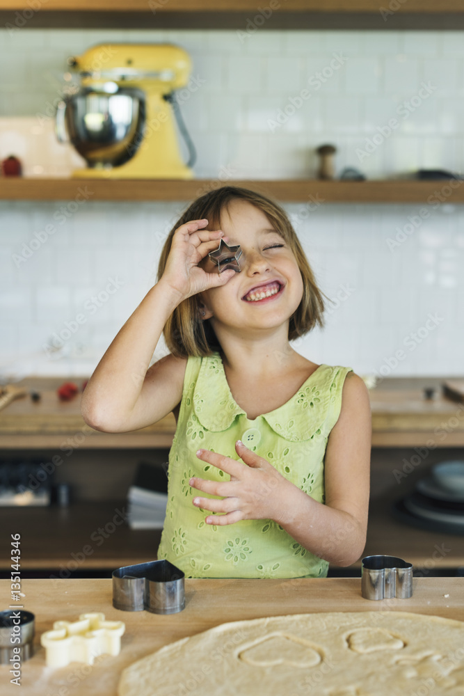 Girl Making Cookies Learning Baking Concept