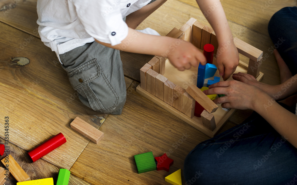 Little Children Playing Toy Blocks