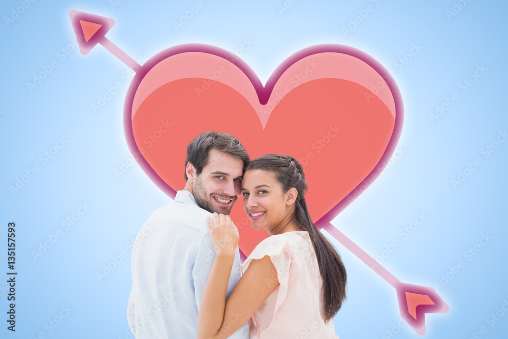 Composite image of attractive young couple smiling at camera