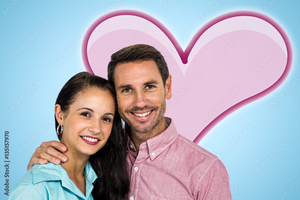 Composite image of smiling couple looking at camera