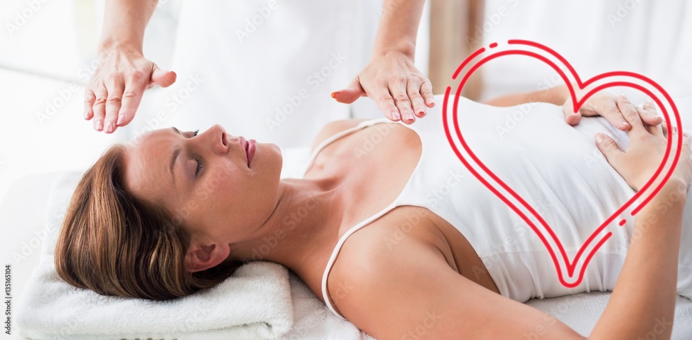 Composite image of massage session woman love heart