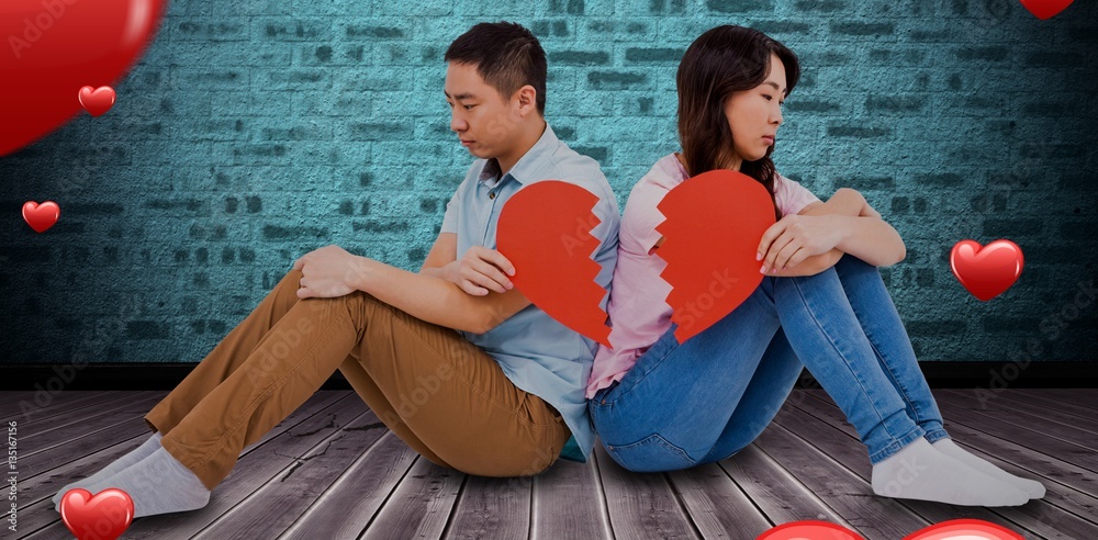 Composite image of sad couple holding broken heart pieces 3D