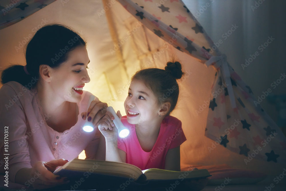 Mom and child reading a book