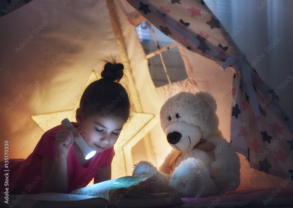 child reading a book