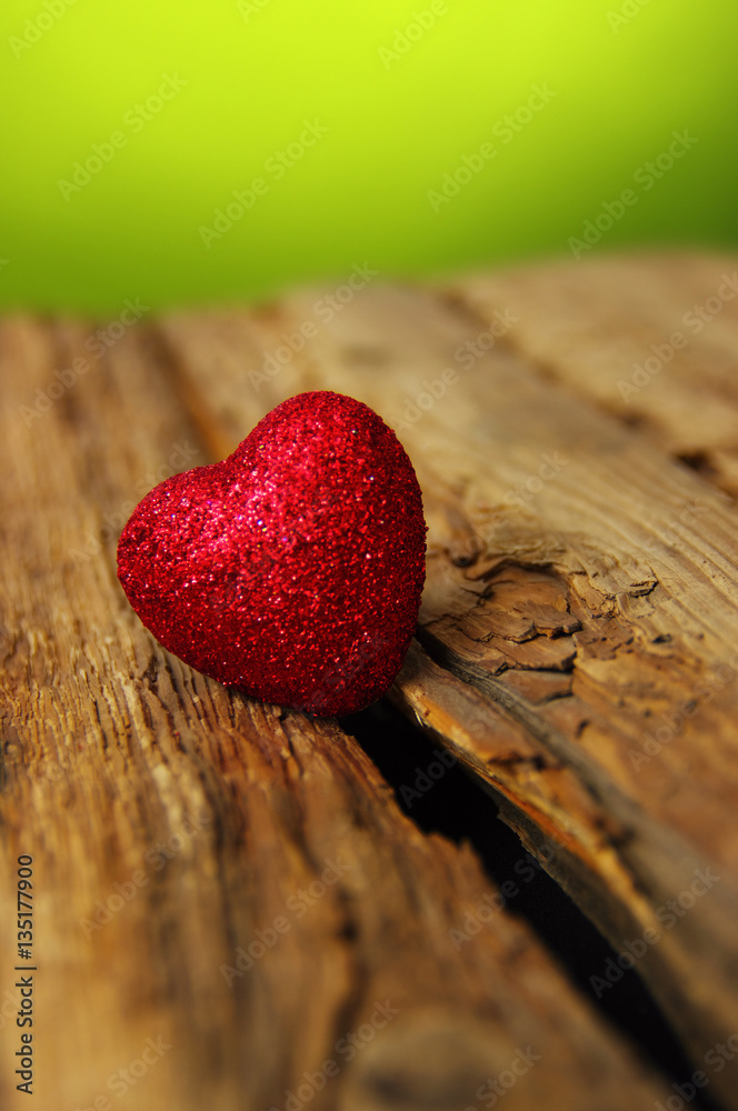 Red heart on a wood