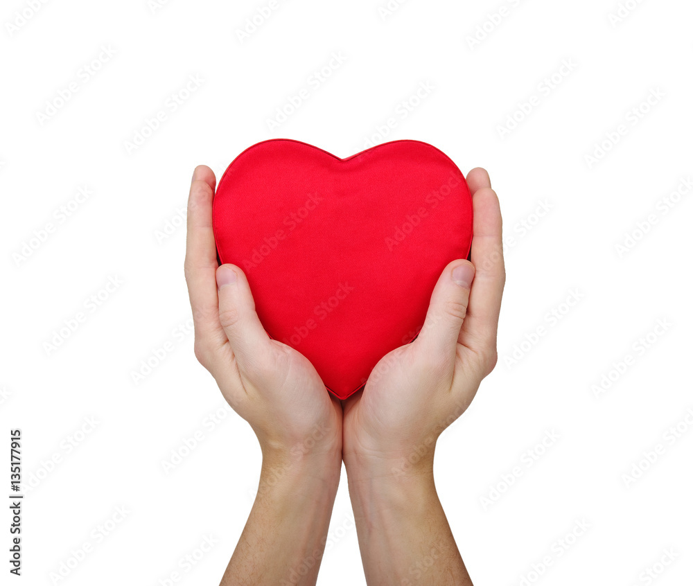 Red heart in hand