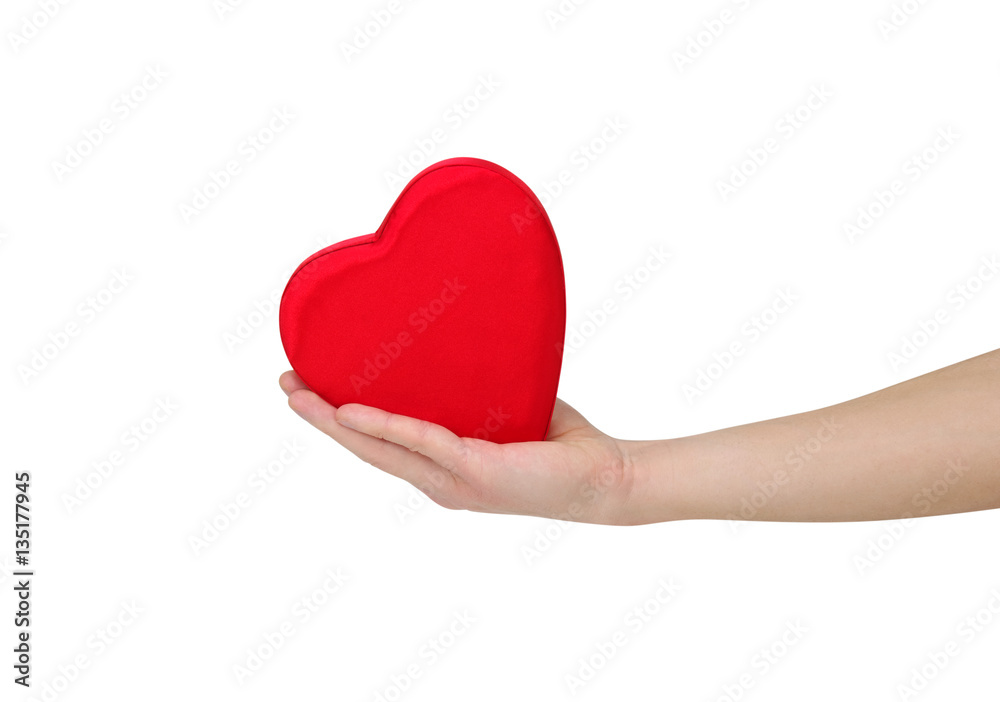 Red heart in hand