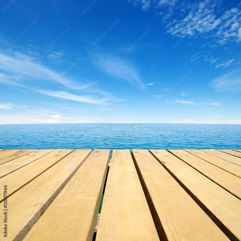 Wood, blue sea and sky